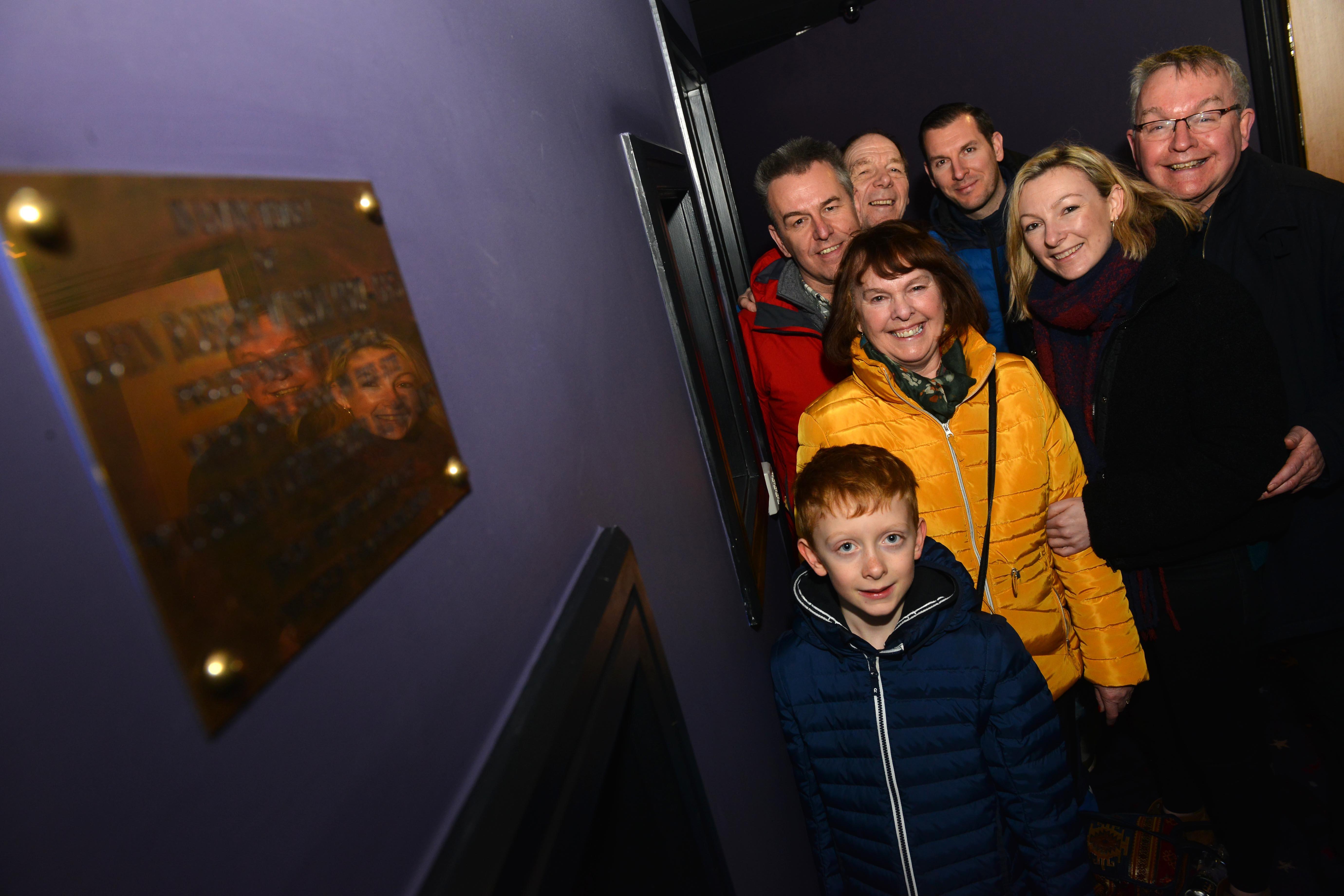 Relatives of former projectionist John Wilson met at the Empire Cinema, Sunderland, to mark 25 years since his death and are pictured next to a plaque in his memory.