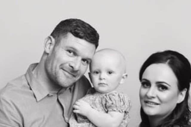 Richie pictured with daughter Quinn and partner Carol.