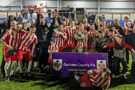 Ryhope CW players, coaches and supporters celebrate their Durham Challenge Cup Final win after they came through a penalty shoot-out to see off Northern League rivals Crook Town
