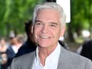 Phillip Schofield’s We Buy Any Car images are replaced online after allegation of jumping the queue, at Westminster Hall. (Photo by Gareth Cattermole/Getty Images)