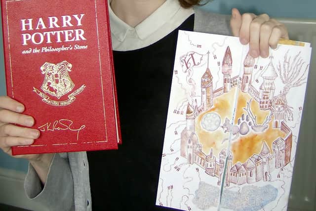 Chloe Esslemont aged 16 with her Harry Potter book prize and entry.