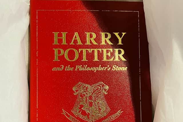 The leather-bound special 15th anniversary edition of Harry Potter and the Philosophers Stone - published exclusively for the competition in 2012.