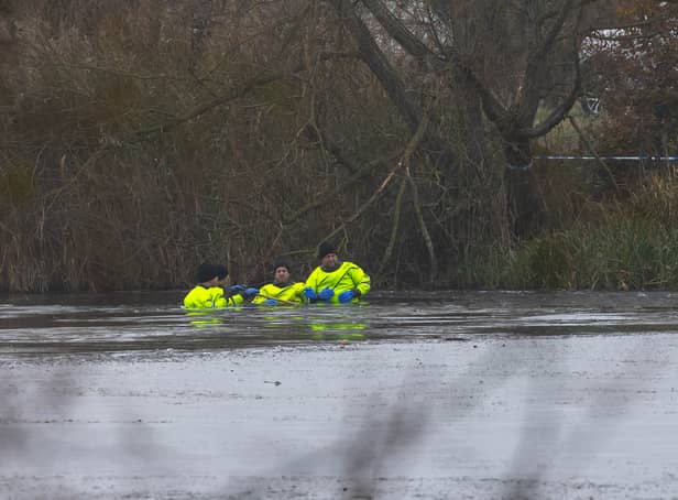 <p>Rescue teams searching the freezing lake in Solihull for survivors.</p>