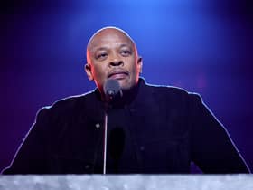  Dr. Dre introduces Inductee Eminem onstage during the 37th Annual Rock & Roll Hall of Fame Induction Ceremony at Microsoft Theater on November 05, 2022