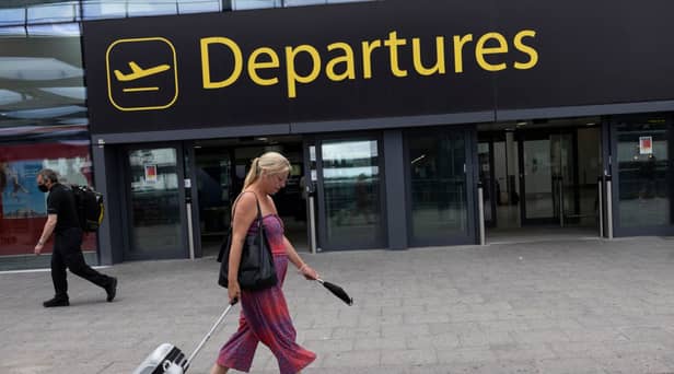 Travellers at Gatwick Airport on July 30, 2021 in London, England. (Photo by Dan Kitwood/Getty Images)