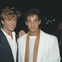 Singers George Michael (left) and Andrew Ridgeley of pop duo Wham!, at the premiere of the film 'Dune', London, England, 1984. (Photo by Fox Photos/Hulton Archive/Getty Images)