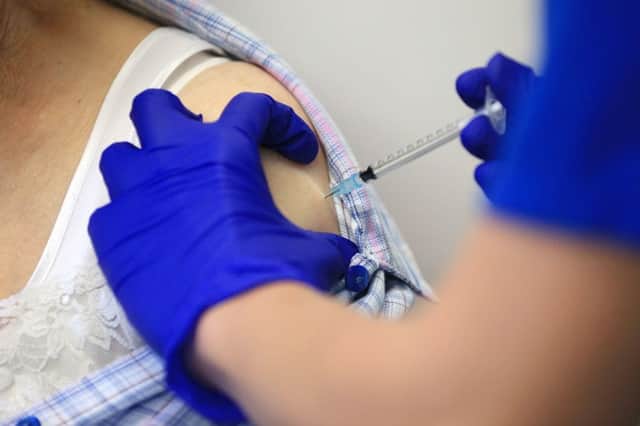 Mixing vaccines can results in an increase of symptoms including chills and a fever (Getty Images)
