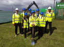 City Mayor, Cllr Councillor Dorothy Trueman, is joined by pupils Sienna Bogie and Thomas Newton for the turf cutting ceremony to celebrate the building of the new school.