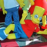A file image of a performer in a Bart Simpson costume. By Getty Images