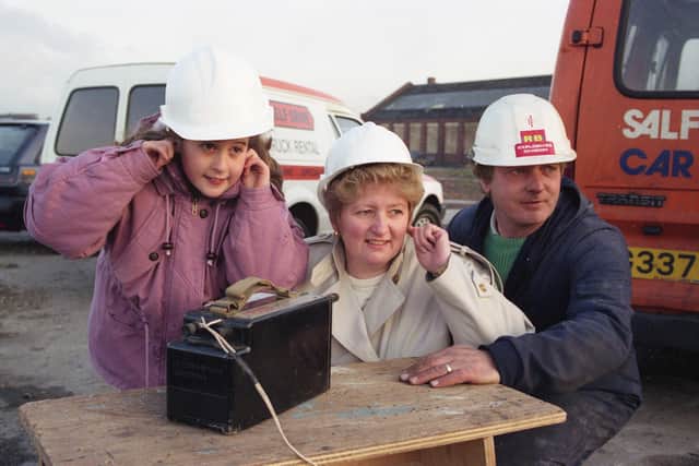 Old Sunderland forge bites the dust in 1991.Lauren Baldassarra, 9, and Ann Tipling. a partner in Instrip Demolition of Washington, watch with expert John Turner.