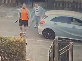 CCTV shows the two men chasing a victim while wielding machetes. 