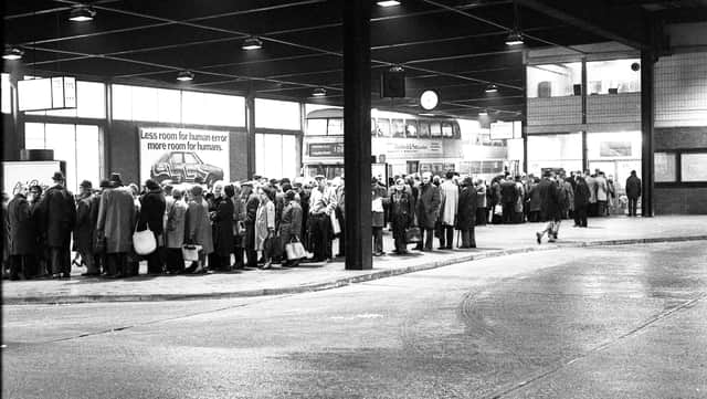 Pensioners queue for the new travel passes at the Corporation bus depot in Sunderland in 1980.