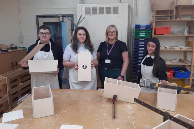 Deputy headteacher Karyn Taylor with some of the pupils making their drums.