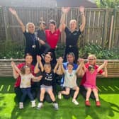 Staff and children at Seaham Kindergarten celebrate their outstanding Ofsted report.