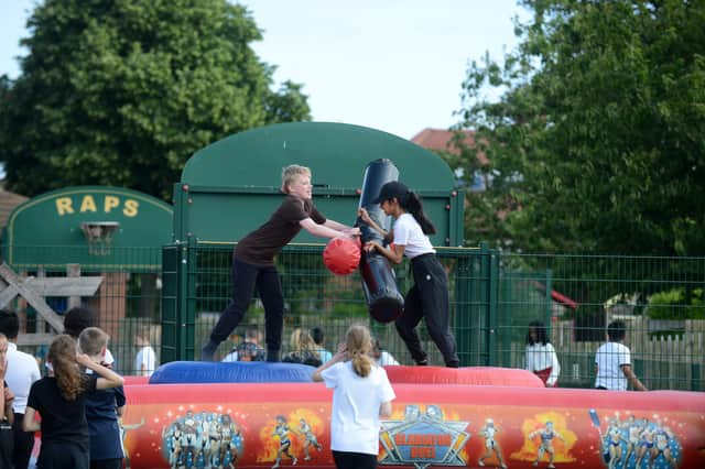 Children taking part in the gladiator challenge as part of Sports and Wellbeing Week.