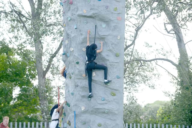 Pupils put their skills to the test on the climbing wall.