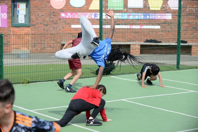 One pupil shows off their acrobatic skills.