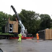 The new Roker Park café is lifted into place by crane