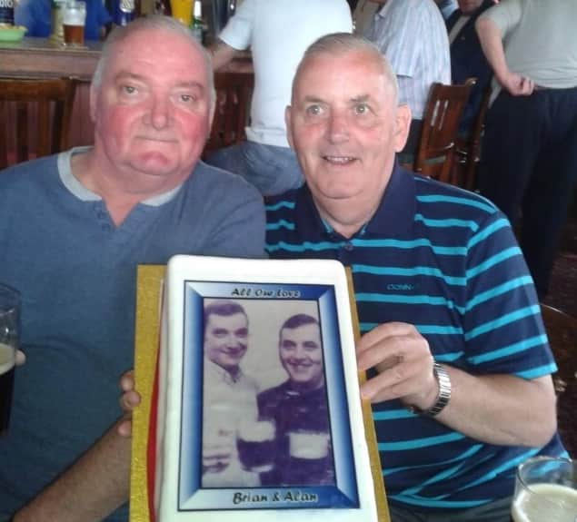 The brothers with the cake to celebrate the 30th 'kidney-versary' in 2013.