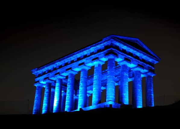Picture by Sunderland City Council of Penshaw Monument lit blue.
