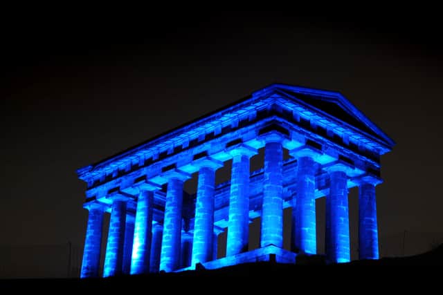 Picture by Sunderland City Council of Penshaw Monument lit blue.