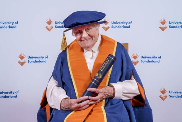A delighted Elsie Ronald receiving her Honorary Fellowship.