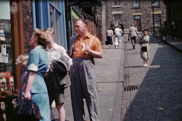Window shopping in Durham in the 1950s.