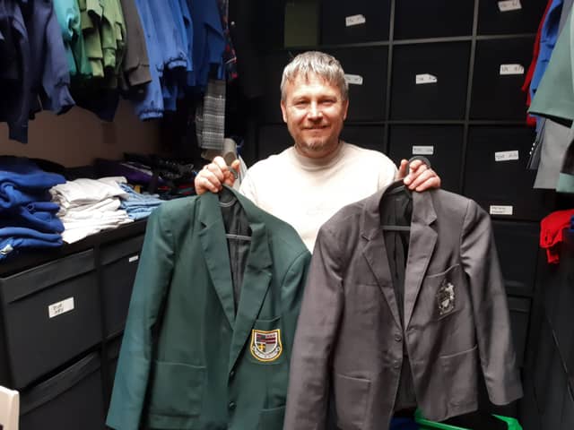 Building Blocks Day Centre founder, Lee Nicholson, with some of the pre-loved school uniform items.