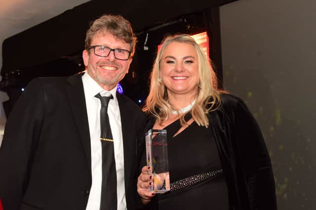 Zoe Chandler collects the Social Enterprise of the Year Award for Weights & Cakes, presented by Kevin Marquis, Social Enterprise manager at sponsor the North East BIC
