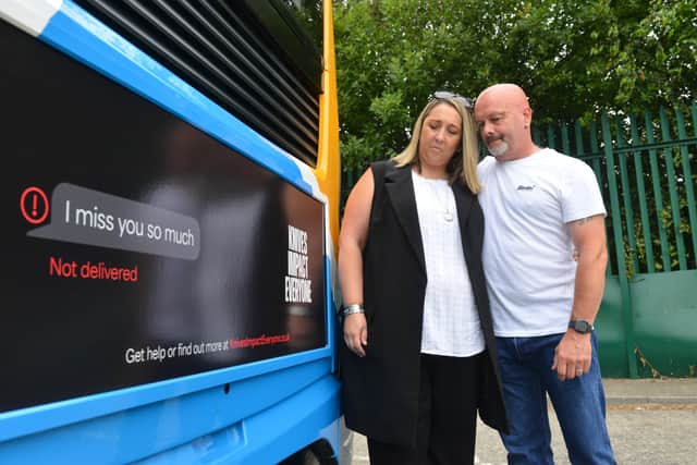 Tanya and Simon Brown with one of the new bus ads