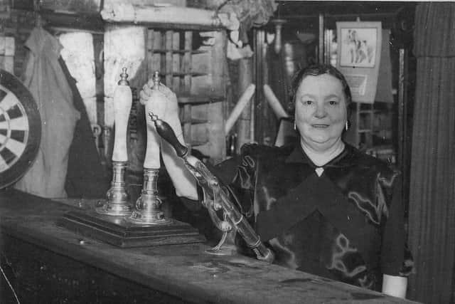 Elizabeth Ann Vickery is pictured at the bar of the Engineers Tavern which was a Sunderland pub from 1864 to 1971. Elizabeth was known as a groundbreaking woman who became the first female chairperson of the Licensed Victuallers Association.Photo: Ron Lawson.
