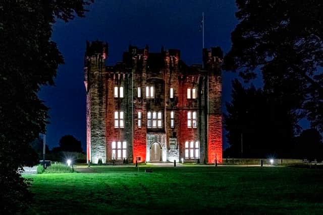 Sunderland City Council picture of Hylton Castle lit in England colours.