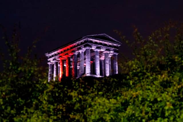 Sunderland City Council picture of Penshaw Monument lit in England colours.
