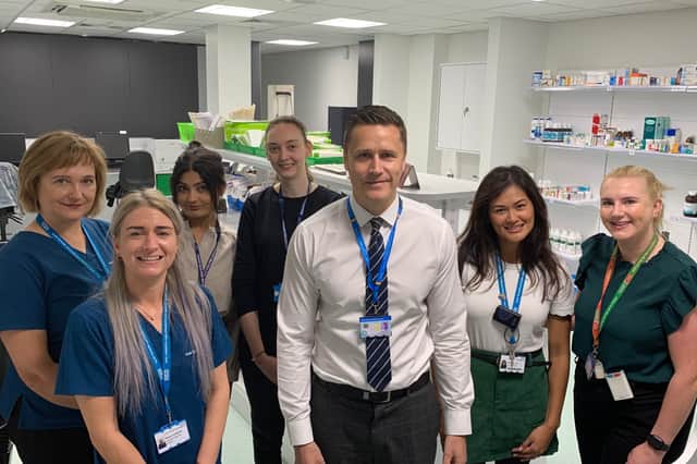 James Hubbard, Superintendent Pharmacist for CHoICE, with Trust and CHoICE staff in the new Outpatient Pharmacy