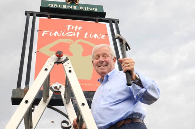 Race founder Sir Brendan Foster outside Greene King’s The Bamburgh pub, which has been temporarily renamed as ‘The Finish Line’ in celebration of this year’s AJ Bell Great North Run. Picture c/o Greene King.