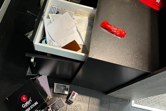 Drawers had been ransacked and products strewn across the floor.