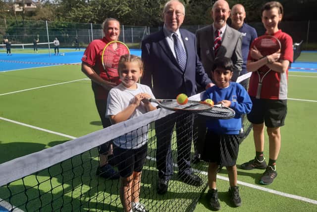 Hetton Primary School pupils Isabelle Malkin, 8, and Jason Sing, 8, join councillors James Blackburn and John Price, LTA representative Paul Sheard and Everyone Active coaches Nicola Keerie and Ashleigh Baines, for the official unveiling of Hetton Park's new tennis courts.