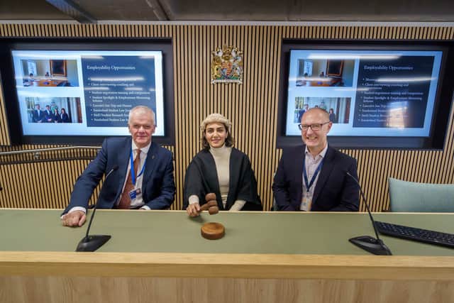 Sir David Bell, Pardis Tehrani, Associate Head of Law School in the Faculty of Business, Law and Tourism, and Professor Lawrence Bellamy in the mock law (moot) court