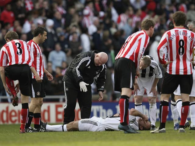 Alan Shearer on the ground at the Stadium of Light after a coming together with Julio Arca 