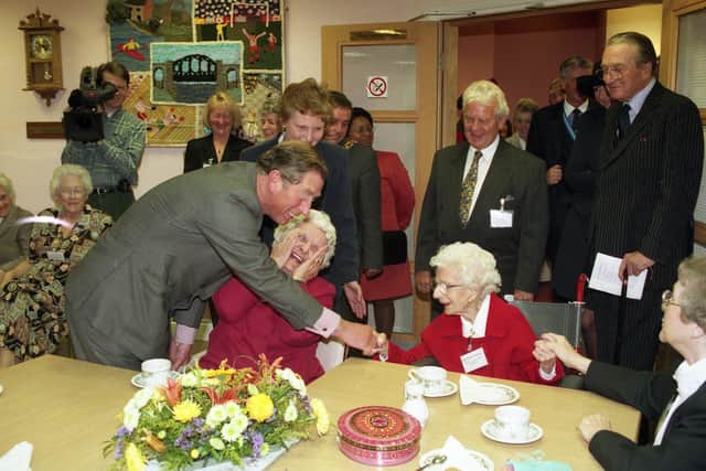 Dorothy Ovenden shaking hands with Prince Charles in Sunderland.