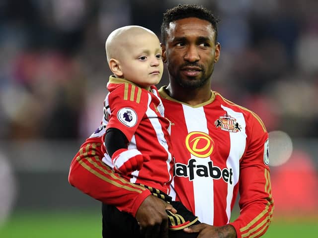 Bradley Lowery with Jermain Defoe. (Photo by Laurence Griffiths/Getty Images)