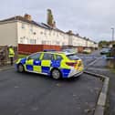 A police cordon remains in place
