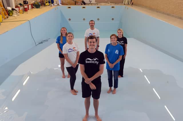 Monkwearmouth Academy swimming pool is being taken over by Swim City. Pictured are siblings Jonny Carlisle, Stacy Arslan and Abi Carlisle, with instructors Ashlyn Liddle, Chris Nicholas and Ella Harrison.