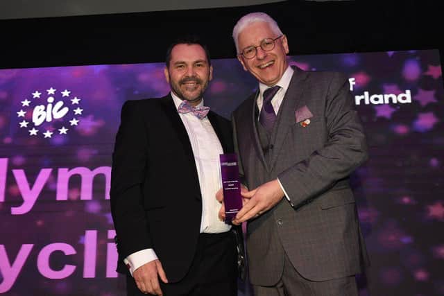 Paul McEldon presents the Sole Trader winners award to Andy Buddin of Andyman Upcycling, at the 2021 Portfolio Awards.