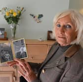 Christine Tindle, 68, with a photograph of her as a child with her mother, Jean Altoft.