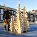 Submitted picture of Leon Garshong with his eco Christmas trees.
