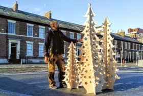 Submitted picture of Leon Garshong with his eco Christmas trees.