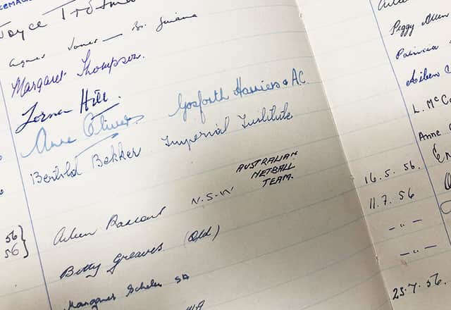 Visitors from afar left their mark on the school's guest book, including this excerpt from 1956.