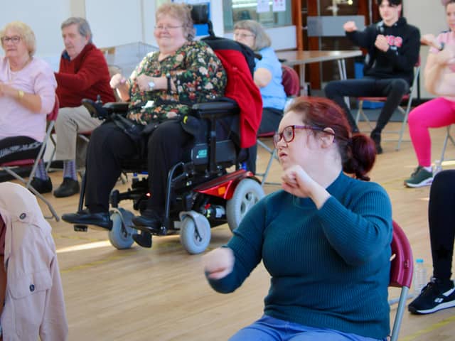 Jane Bray and other participants taking part in one of the Sit to Be Fit sessions.