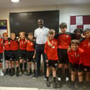 Gary Bennett with the U12s SAFC team at the Academy of Light.